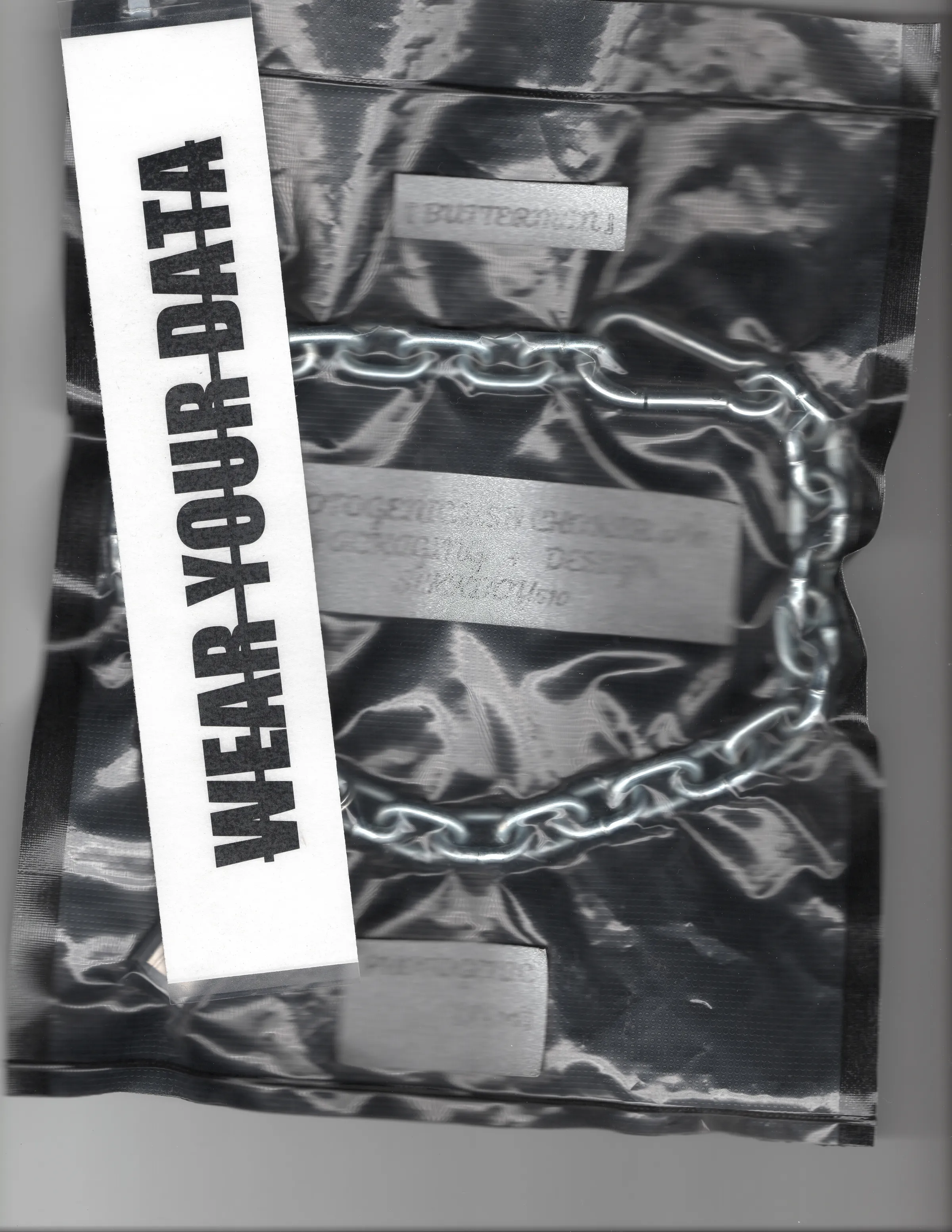 A flatbed scan of the physical Cold Storage package labeled WEAR YOUR DATA.
